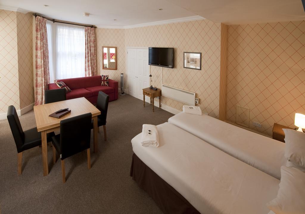 Astons Apartments Лондон Номер фото